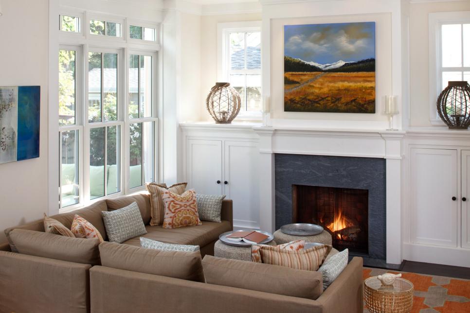 The living room design experts at HGTV.com share 15 tips for creating a cozy living room.