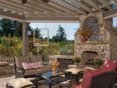 Traditional Pergola Over Fireplace and Seating Area