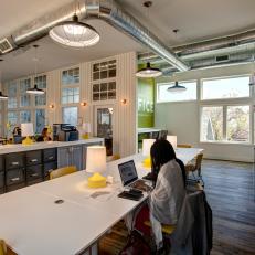 The Office at Adas With Exposed Ductwork & Plenty of Desk Space