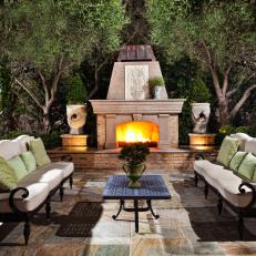 Courtyard Features Fireplace & Wrought Iron Furniture