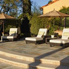 Sunbathing Patio With Plush Chaise Lounges