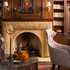 Sophisticated Home Office With Ornately Carved Fireplace