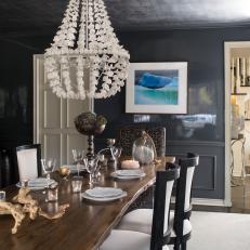Charcoal Gray Dining Room Boasts High-Gloss Walls