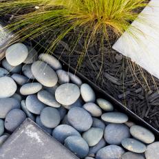 Highlight of a Japanese Garden Featuring Rocks and Ornamental Grass