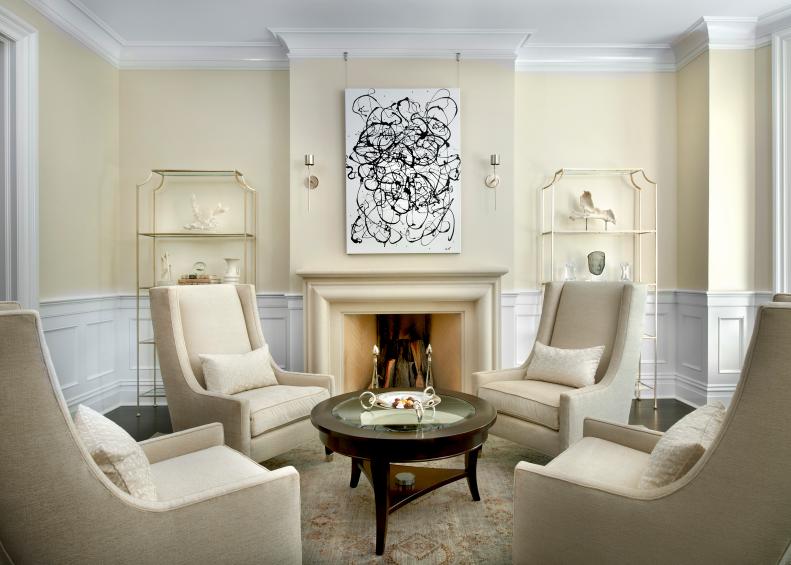 Neutral Transitional Sitting Room With Fireplace & Neutral Chairs