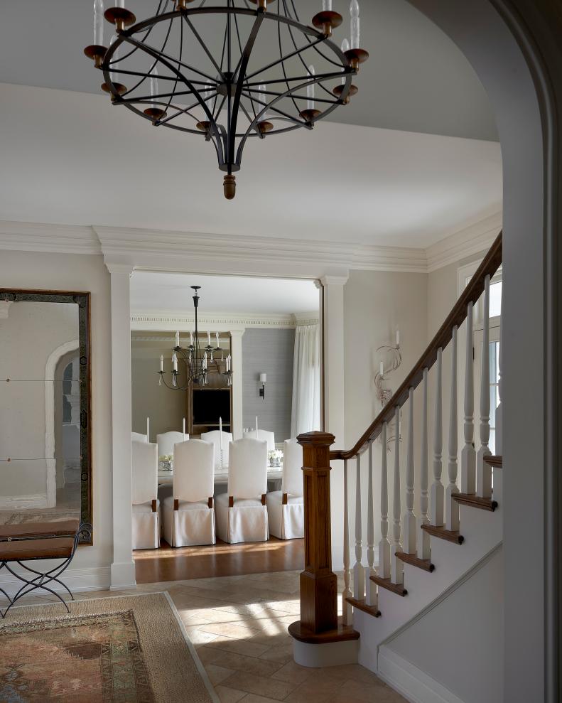 Neutral Foyer With Traditional Wood Staircase