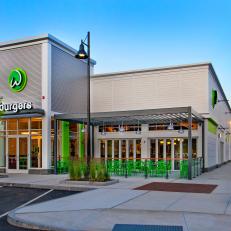 Contemporary Wahlburgers Exterior with Green Accents 