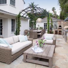 Spacious Neutral Backyard Boasts Outdoor Living Room 