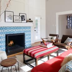 Living Room Features Mantel With Bold, Blue Pattern