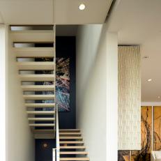 Modern Stairway With Dark Accent Wall