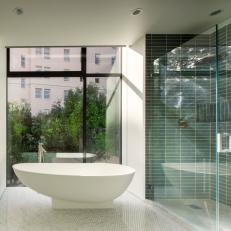 Sleek, Modern Bathroom With Freestanding Tub & Glass Shower