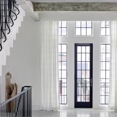 Elegant Black & White Entry With Slim Front Door