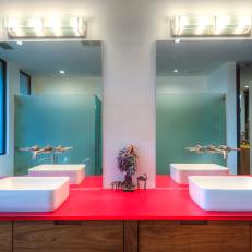Master Bath Features Red Countertop & Vessel Sinks
