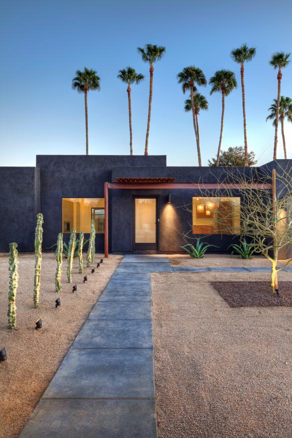 Southwestern Home Exterior Is Landscaped and Hardscaped