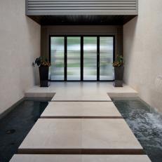 Inventive Water Courtyard With Floating Steps