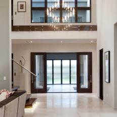 Contemporary Foyer With Rich Brown Accents