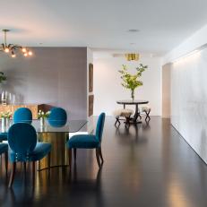 Contemporary Dining Room With Teal Upholstered Chairs