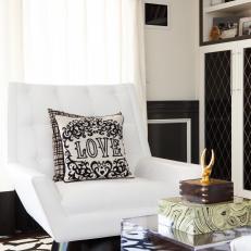 Chic Black and White Living Room with Modern Chair