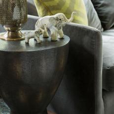 Detail of Drum End Table Features Lamp & Elephant Sculptures