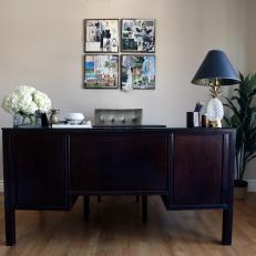 Sophisticated Office With Dark Wood Desk & Pineapple Lamp
