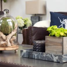 Photos Hgtv Coffee Table With Spiked Candle Holder Natural Wood Planter And Gl Cloche