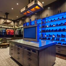 Masculine Closet Features LED Lighting and Pop-Up TV