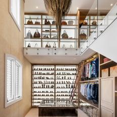 Two-Story Walk-In Closet With Bronze Chandelier 