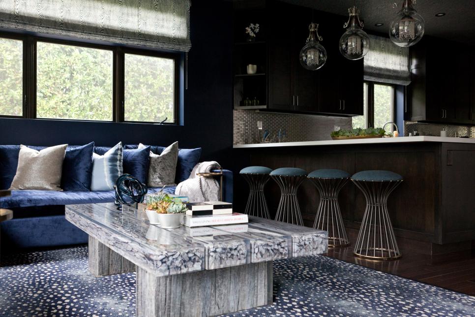 Contemporary Blue Living Area With Blue Sofa and Wood Coffee Table