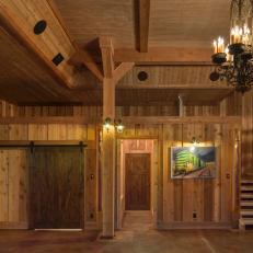 Rustic Wood Foyer With Sliding Barn Door