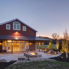 Red Party Barn Exterior With Back Patio With Square Fire Pit