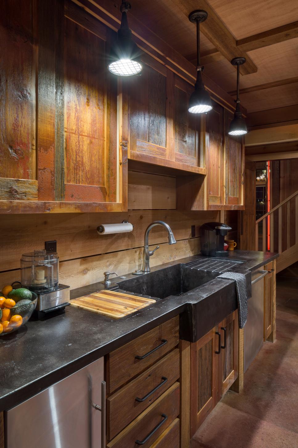Kitchen Sink With Rustic Wood Cabinetry, Wood Cabinets With Dark Countertops