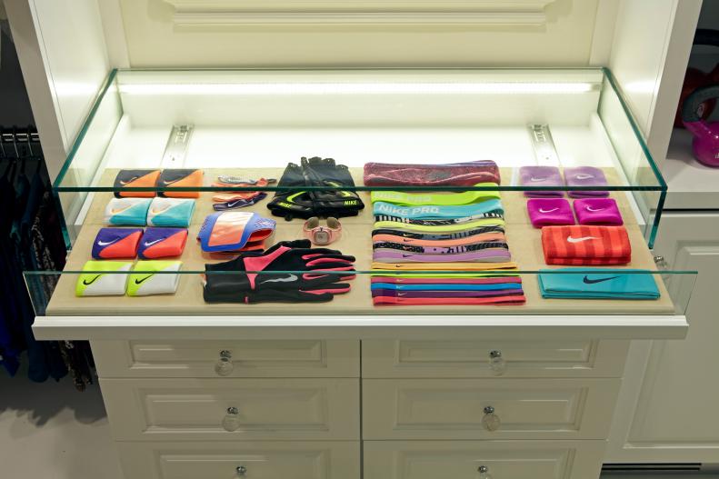 Contemporary Walk-In Closet With Custom Glass Accessory Case 