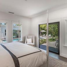 Crisp Transitional Bedroom With Deck Access