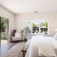 Calm, Neutral Bedroom With Private Patio Access