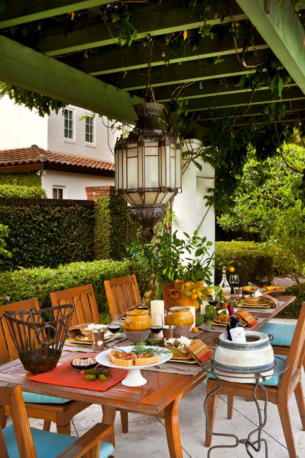 Outdoor Dining Room With Wood Dining Table and Chairs