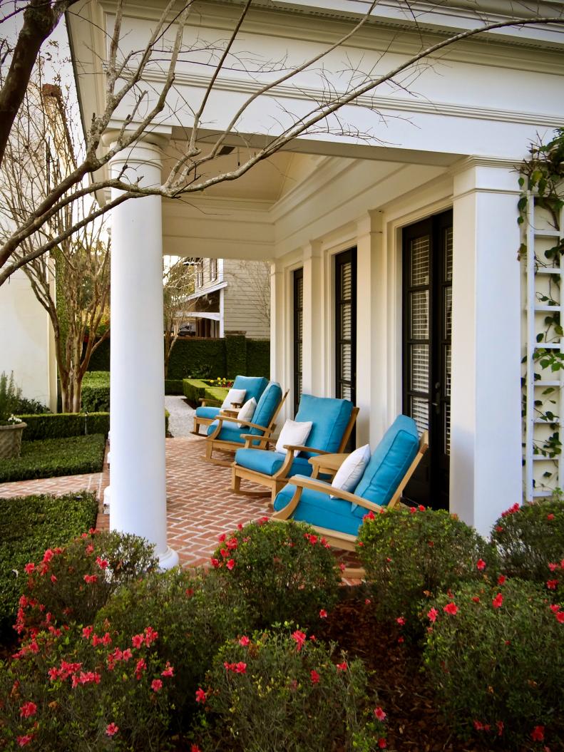 Wood Chairs With Blue Cushions on Traditional Porch