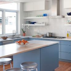 Blue and White Transitional Open Plan Kitchen With Oranges