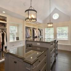 Sophisticated Master Closet Features Built-In Storage
