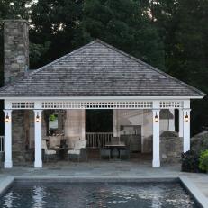 Traditional Pool Cabana with Open-Air Design