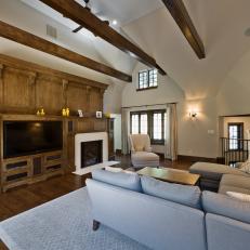 Traditional Family Room With Vaulted Ceiling and Exposed Beams