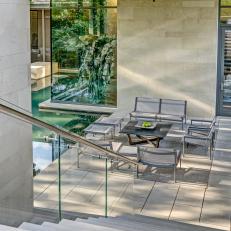 Contemporary Open Air Patio With Stainless Steel Furniture