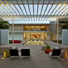 Contemporary Pergola Blends Seamlessly With Chic Pool