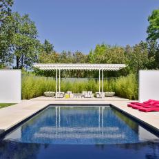Contemporary Pool and Pergola With Minimalist Landscaping