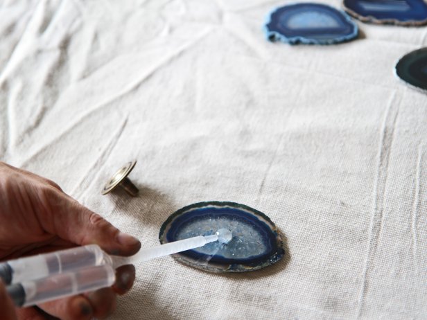 Place a dime size amount of 2 part epoxy onto the center of each agate piece.