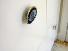 Spruce up an old dresser or your kitchen cabinets with agate knobs accented with gold metallic paint.