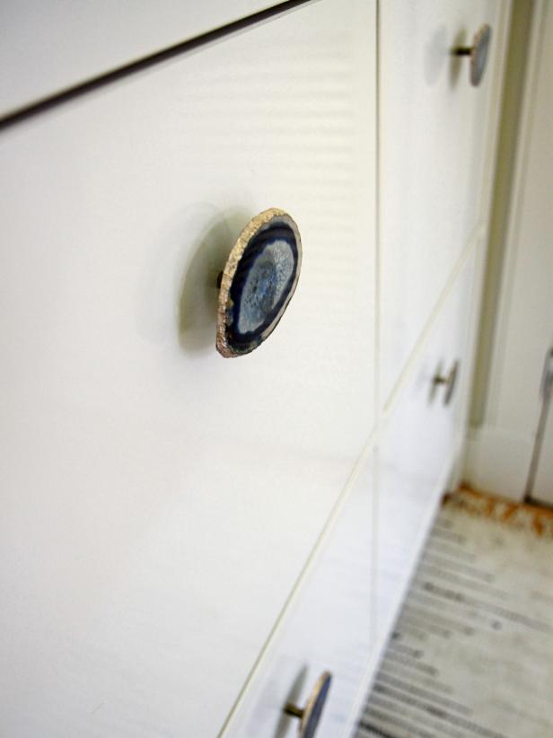 agate drawer pull on a plain white dresser