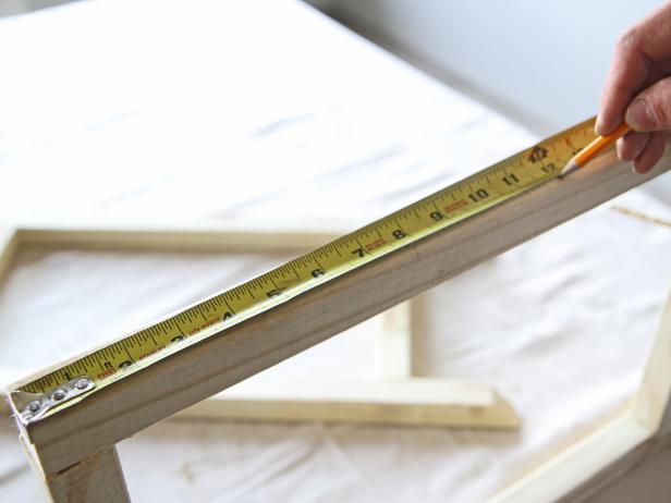 Measure 12” from the square end of each leg, and mark with a pencil