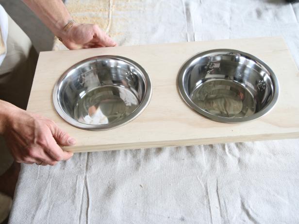 Place the bowls inside of the cut-outs to ensure they fit. Make adjustments if necessary.