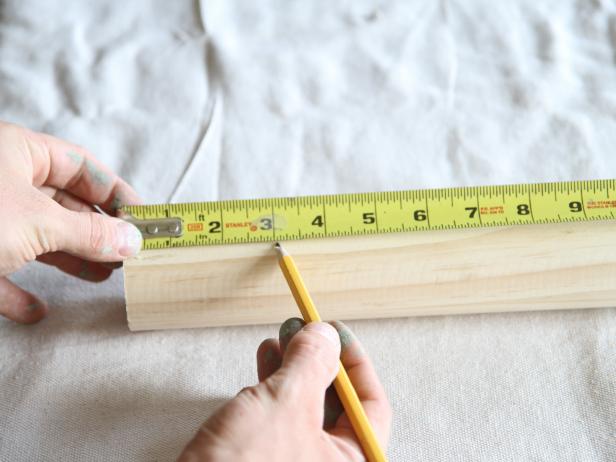 Measure and mark the 2” round dowel at 3” with a pencil.