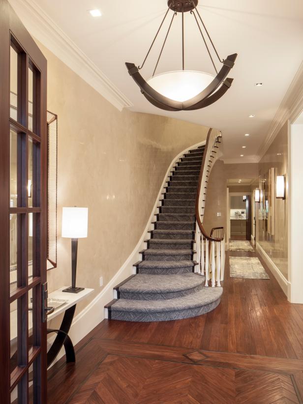 Transitional Foyer and Hallway With Hardwood Floors